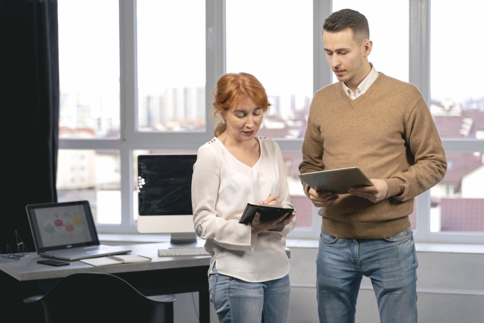 Financial consultation reviewing quarterly business performance metrics