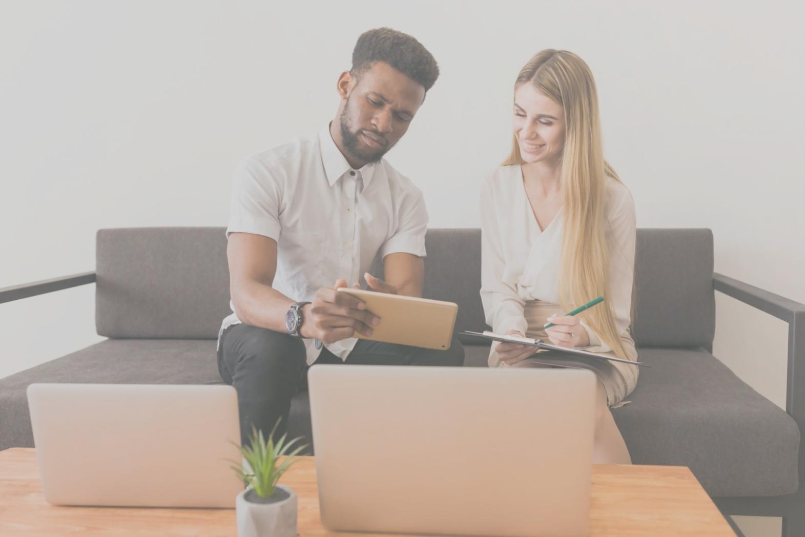 Business owner reviewing financial reports and growth metrics with somerexvia team